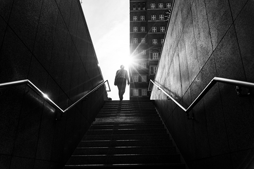 man-walking-on-stairs