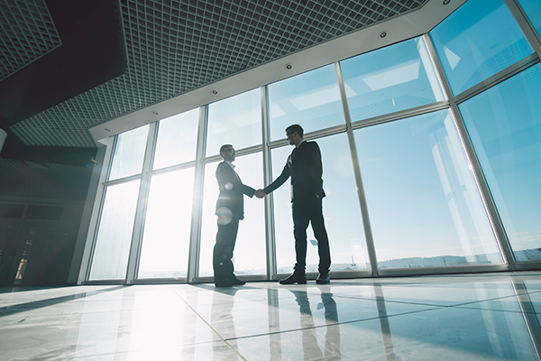 two-businessman-shaking-hands